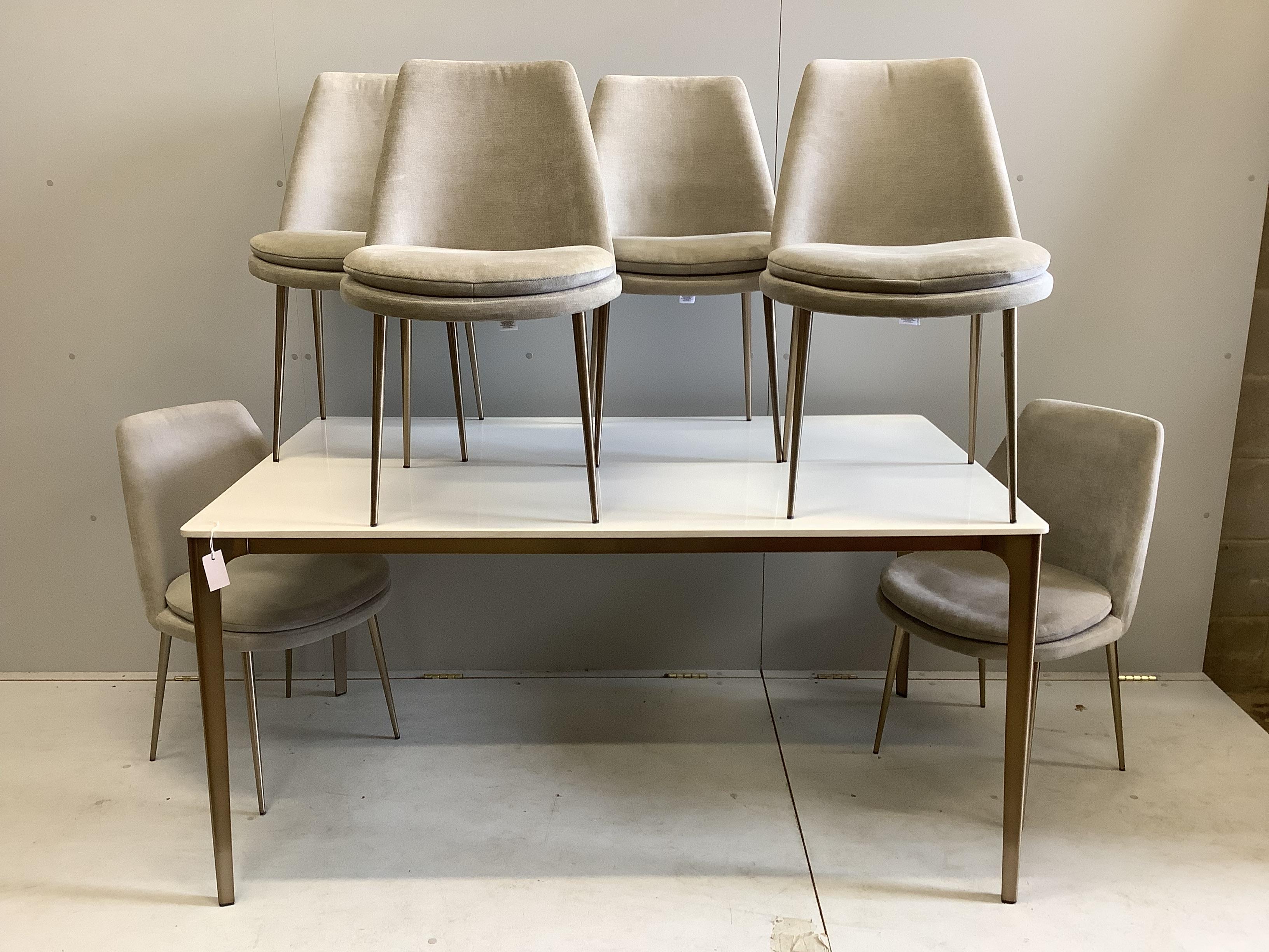 A Contemporary 'West Elm' furniture gilt metal and melamine dining table, width 152cm, depth 91cm, height 75cm, and six chairs